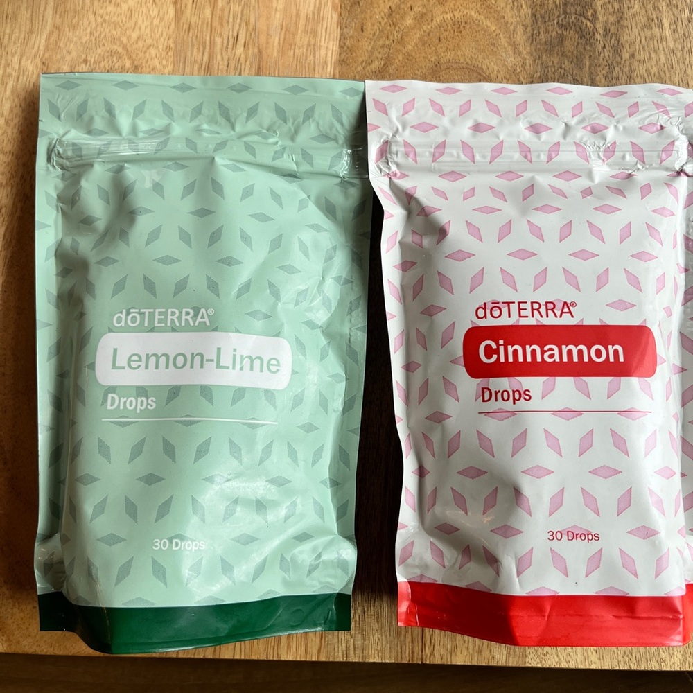 doTERRA Lemon-Lime and Cinnamon Drops in Green and Red Packaging duo